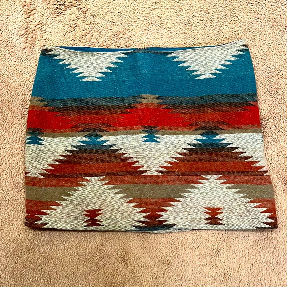 Wool-ish material Aztec print fitted skirt with zipper and small hook clasp.